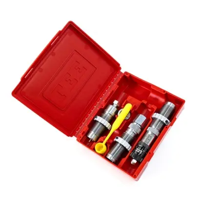 The set includes a Full Length Sizing Die, Powder Through Expanding Die, Micrometer Bullet Seating Die, Universal Shell Holder, Powder Dipper, and Instructions with reloading data.
