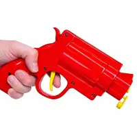 Dávkovač kečupu a hořčice ve tvaru revolveru