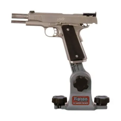 A fixture for securely holding the magazine well of a 1911 pistol during cleaning and light gunsmithing tasks. Designed for use with the Tipton Best Gun Vise. Can also be mounted directly to a workbench.